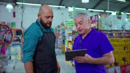 Supermarket Manager Addressing Inventory Issue with Employee, Strict Boss Reprimanding Staff Holding Tablet at Grocery Store, Dispute at Workplace