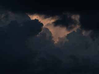 a dark cloud is creeping over the blue sky. Beautiful Cumulus clouds flying across the sky, Beautiful natural clouds move quickly across the sky, deep blue sky