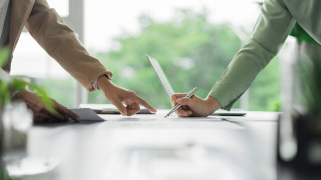 Alternative energy environment businesspeople discuss and brainstorming about renewable energy data