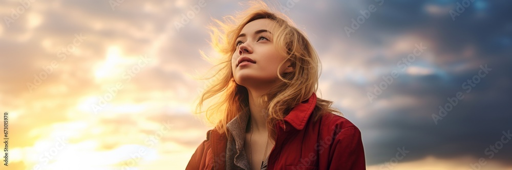 Canvas Prints Caucasian woman looking at sunset sky