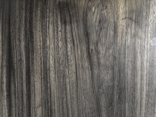 Wood table texture as background.