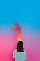 woman back angle with head on fire, burnout, pink and blue gradient background with flames
