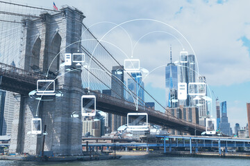 Brooklyn bridge with New York City Manhattan, financial downtown skyline panorama at day time over...