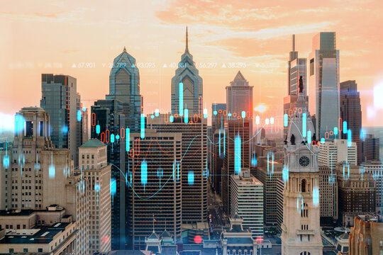 Aerial panoramic skyline of Philadelphia financial downtown, Pennsylvania, USA. City Hall Clock Tower at sunset. Forex candlesticks and bar graph hologram. The concept of internet trading, brokerage