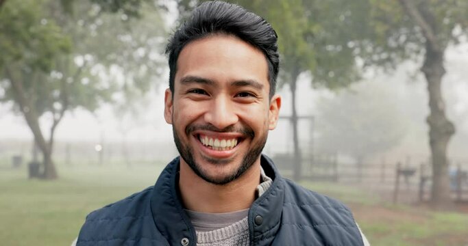 Face, smile and Asian man outdoor, nature and happiness with fresh air, wellness and freedom. Portrait, male person and happy guy outside, Japanese and chilling in a park, healthy and environment