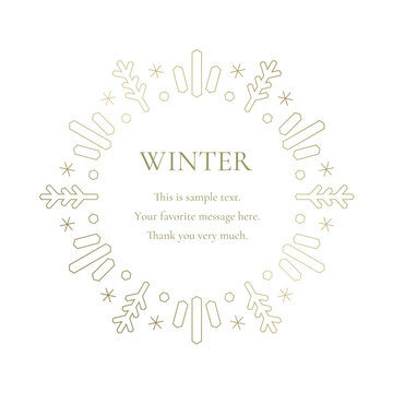 素材_フレーム_雪の結晶と光をモチーフにした冬の飾り枠。金色の高級感のある囲みのデザイン
