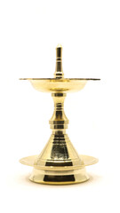 a vintage, brass oil lamp of unique traditional design used for temple celebration and festival...