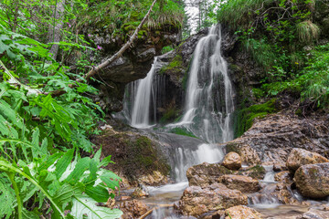 Naklejka na ściany i meble Upper Vallesinella falls in the National Park Adamello-Brenta. Trentino, Italy