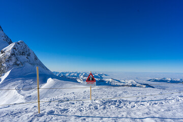 warning sign on jungfrau top of europe - 673061903