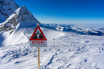 warning sign on jungfrau top of europe - obrazy, fototapety, plakaty