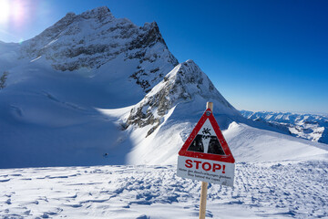 warning sign on jungfrau top of europe - 673061914