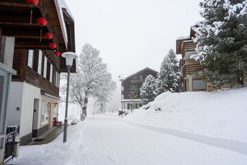 snow scene in murren switzerland during witnter - 673061962