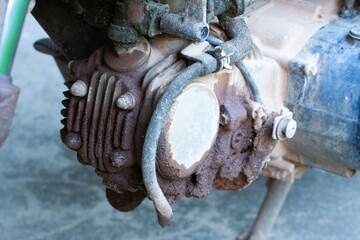 Old motorcycle engine There was mud and oil flowing.