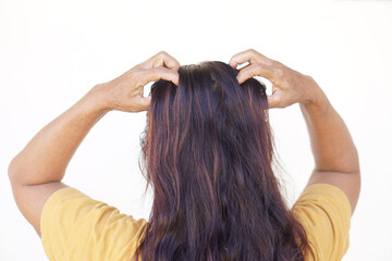 Woman use hands to scratch her itcy hair on head, isolated on white background. Concept, Hair...