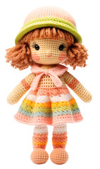 Fototapeta premium Knitted, soft, rag cute doll girl in a green and pink hat and a colorful pastel dress. Isolated on a transparent background.