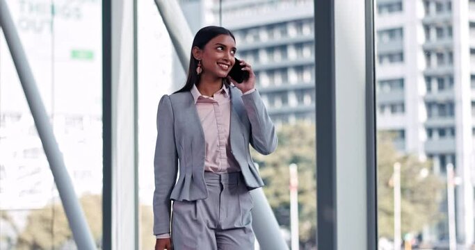 Office, business deal or happy woman on a phone call talking, networking or speaking of ideas. Smile, mobile communication chat or startup developer in conversation for a negotiation offer by window