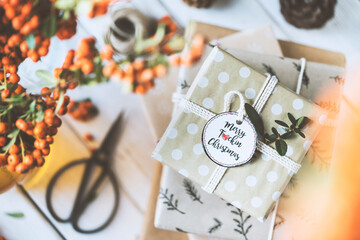 Christmas gift box stack on wooden table