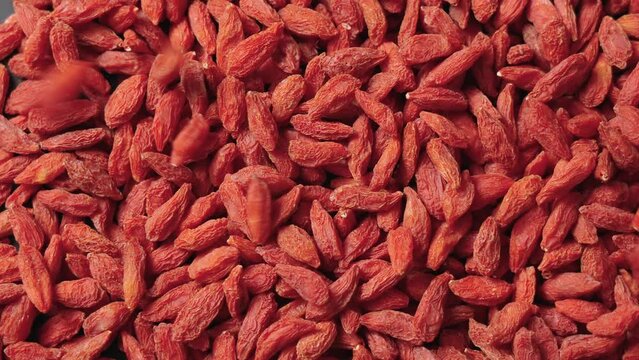 Dried Chinese wolfberries or Goji berry texture Background.