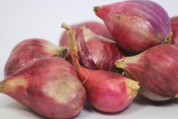 red onions on a white background