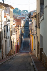 Fototapeta na wymiar long and narrow village street