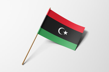 Libya flag of small paper, isolated on white background