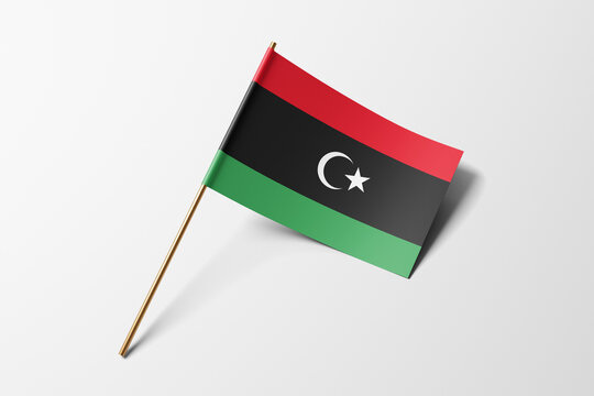 Libya flag of small paper, isolated on white background