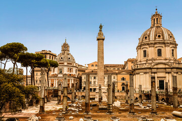 View of Trajan's Forum with Trajan's column, the ruins of the Basilica of Ulpia, and the churches of the Most Holy Name of Mary and Santa maria di loreto, Rome, Italy