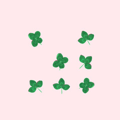 A game of tic-tac-toe between three leaves clovers and four leaves clovers. Creative lucky nature concept.