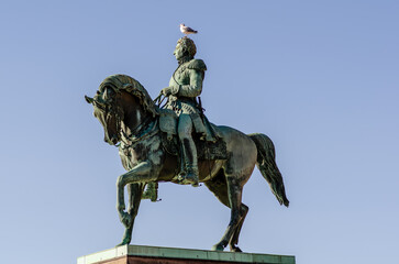 Fototapeta na wymiar Oslo, Norway, royal palace: Statue of Norwegian King Karl Johan XIV in Oslo, Norway