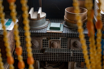 A old retro stove in the kitchen in a country house. A old retro stove in the kitchen in a country house.