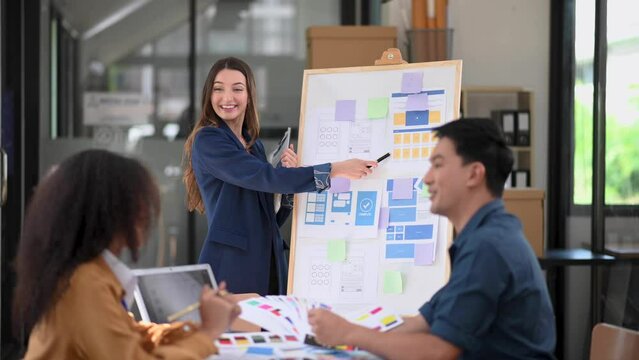 Businessman and woman people meeting in office. Employee brainstorm and work as team, plan and discuss project by point on paper and tablet. .