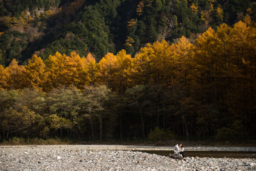 Morning in Kamikochi. Kamikochi National Park in the Northern Japan Alps of Nagano Prefecture, Japan. Beautiful mountain in autumn leaf.