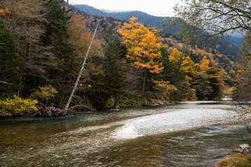 Morning in Kamikochi. Kamikochi National Park in the Northern Japan Alps of Nagano Prefecture, Japan. Beautiful mountain in autumn leaf.