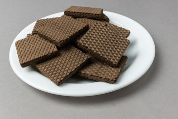 square waffles with chocolate filling on a plate