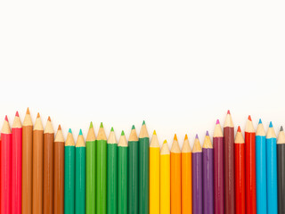 Multicolored pencils isolated on a white background.