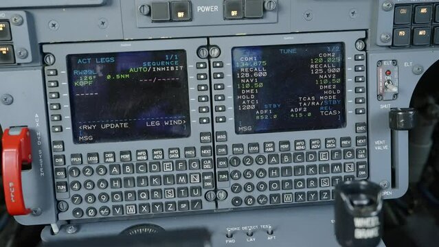 Aircraft control console displaying radar and navigation data on full-color, active matrix screen of premium jet Hawker 750
