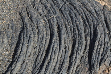 Close up detail of lava fields featuring pahoehoe lava
