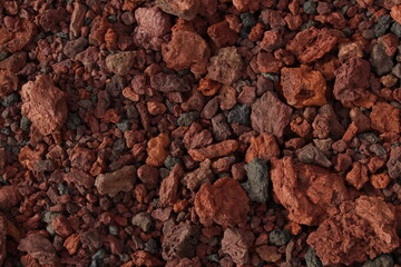 Red volcanic pebbles - obrazy, fototapety, plakaty