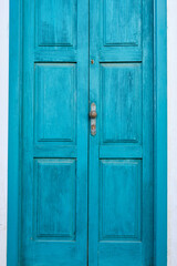 A Blue wooden door isolated on white background