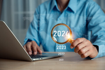 businessman new year business goals 2024, positive indicators 2024 , Planning and challenge strategy business in new year  Concept . - obrazy, fototapety, plakaty