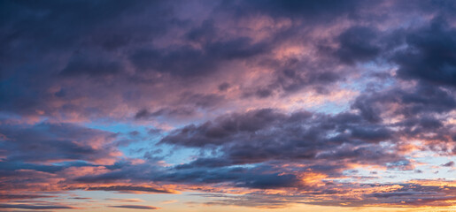 Naklejka na ściany i meble Stormy Sky with dramatic clouds at dawn