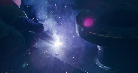Worker Welding Steel At Metal Industry Metalwork Sparks