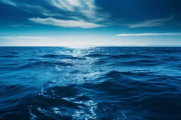 Blue water seas are deep ocean water that appears blue from the sunlight's absorption and scattering. They are found far away. Generative AI