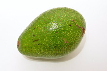 green avocado isolated on white background 