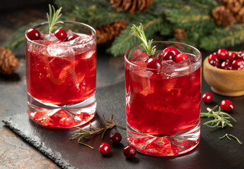 Cranberry cocktail with fresh cranberries and rosemary