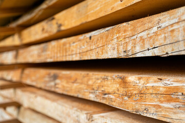 A stack of rough-cut wooden planks set up to dry, Bavaria, Germany.