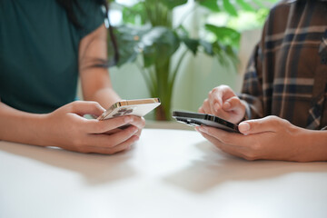 friends using smartphone mobile addict spending time checking social media cell telephone technology Friendship social addiction