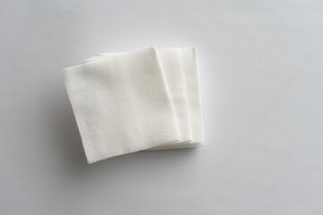 white gauze pads on white background