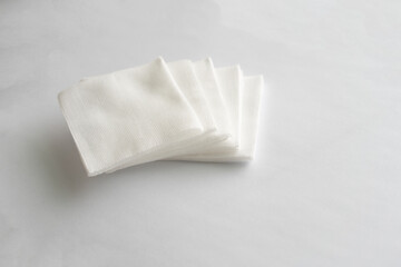 white gauze pads on white background