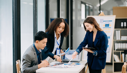 Creative business people working on business project in office